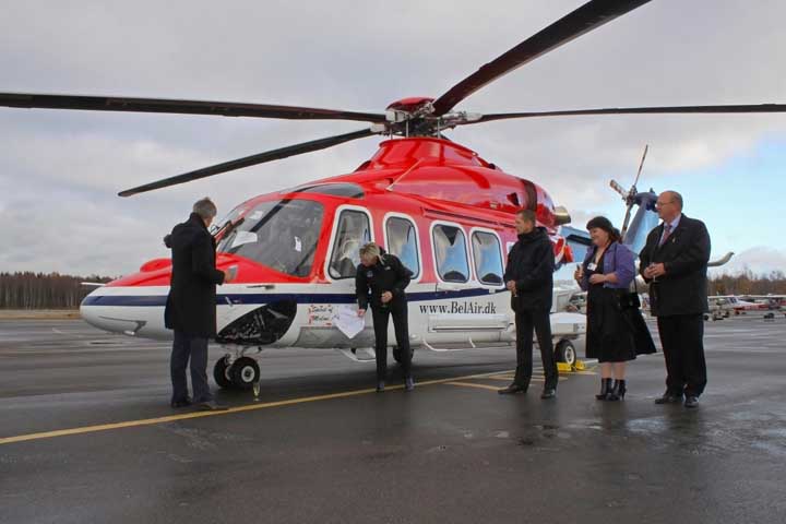 The ambassador of Denmark Jens-Otto Horslund (at left) ceremoniously gave Bel Air's AgustaWestland helicopter the name 